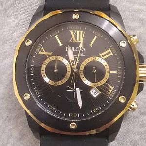 Bulova marine star 100 watch black and gold tone